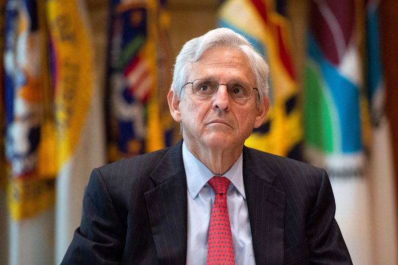 &copy; Reuters. FILE PHOTO: U.S. Attorney General Merrick Garland looks on as he delivers a statement following a briefing from U.S. Marshals Service Director Ronald Davis on a fugitive apprehension initiative aimed at combatting violent crimes in cities with high rates 