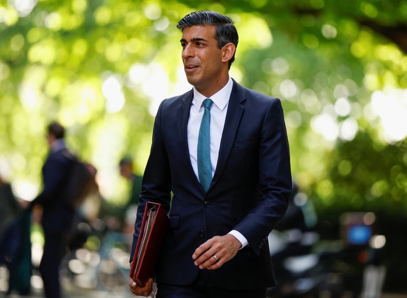 &copy; Reuters. FILE PHOTO: British Chancellor of the Exchequer Rishi Sunak leaves Millbank Studios after a media interview in London, Britain, May 27, 2022. REUTERS/John Sibley
