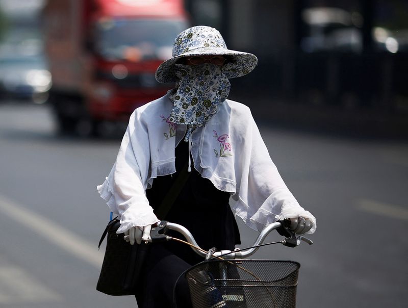 &copy; Reuters. 　７月１３日、中国の複数都市で１２日、最高気温が記録を更新した。写真は北京で２０１４年５月撮影（２０２２年　ロイター／Kim Kyung-Hoon）
