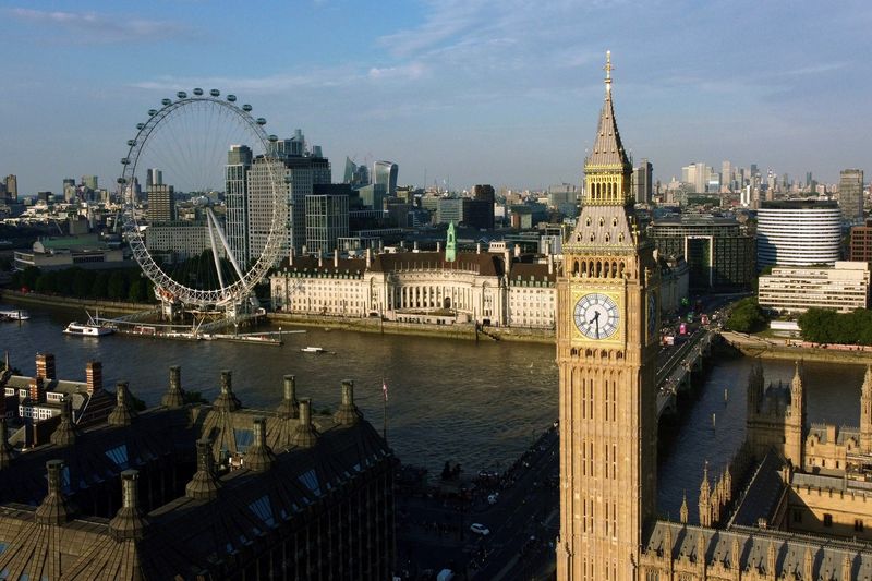 &copy; Reuters. FILE PHOTO: Big Ben and The London Eye are seen on a summer evening in London, Britain, June 15, 2022.  Picture taken with a drone.  REUTERS/Yann Tessier/File Photo