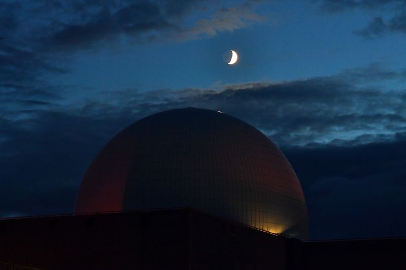 &copy; Reuters. The moon is seen above Sizewell Nuclear Power Station, as the outbreak of the coronavirus disease (COVID-19) continues to affect businesses in Sizewell, Suffolk, Britain, July 25, 2020. Picture taken July 25, 2020. REUTERS/Dylan Martinez