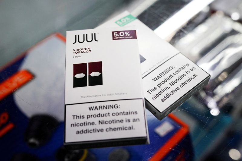 &copy; Reuters. FILE PHOTO: Juul vape cartridges are pictured for sale at a shop in Atlanta, Georgia, U.S., September 26, 2019. Picture taken September 26, 2019. REUTERS/Elijah Nouvelage/File Photo