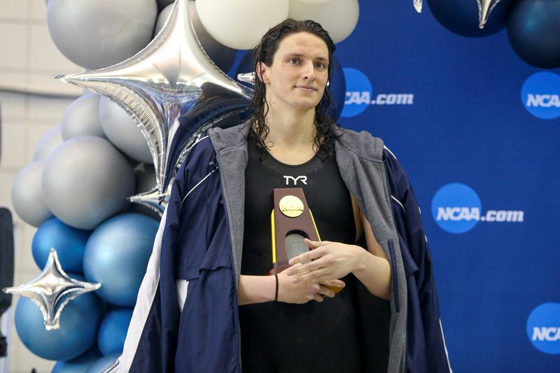 &copy; Reuters. FILE PHOTO: Mar 17, 2022; Atlanta, Georgia, USA; Penn Quakers swimmer Lia Thomas holds a trophy after finishing first in the 500 free at the NCAA Womens Swimming & Diving Championships at Georgia Tech. Mandatory Credit: Brett Davis-USA TODAY Sports