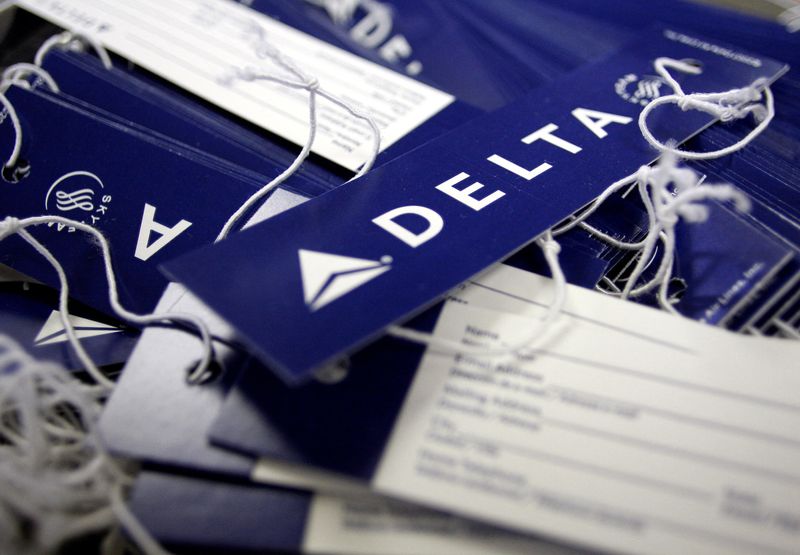 © Reuters. FILE PHOTO: Delta airline name tags are seen at Delta terminal in JFK Airport in New York, July 30, 2008. REUTERS/Joshua Lott