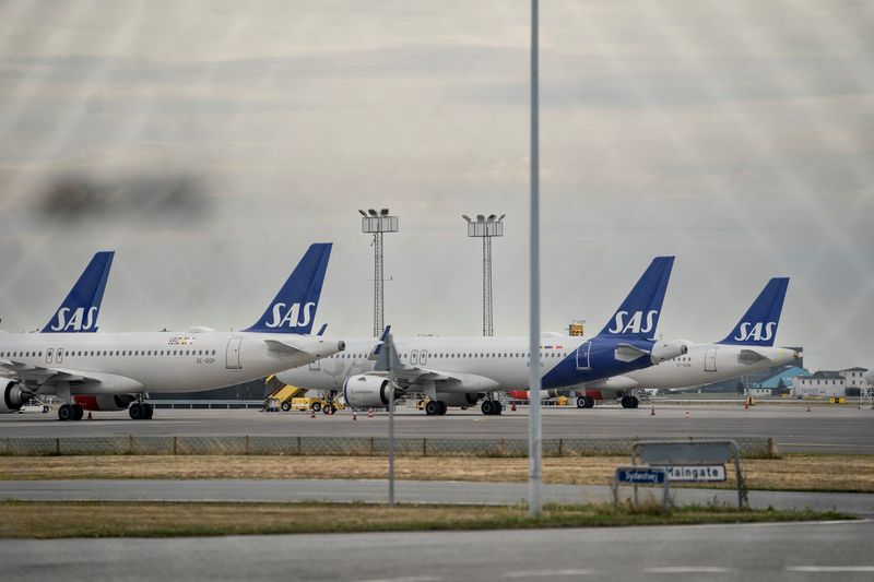 &copy; Reuters. FILE PHOTO: SAS aircrafts are parked on the ground during a pilot strike at Copenhagen Airport, Denmark July 18, 2022. Ritzau Scanpix/Liselotte Sabroe via REUTERS