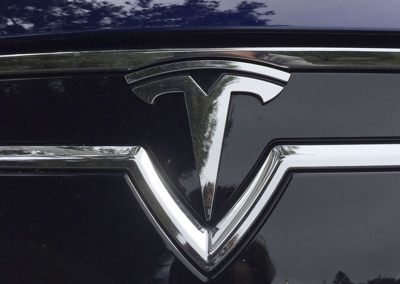 Tesla EV sales gaining momentum in Australia - chair