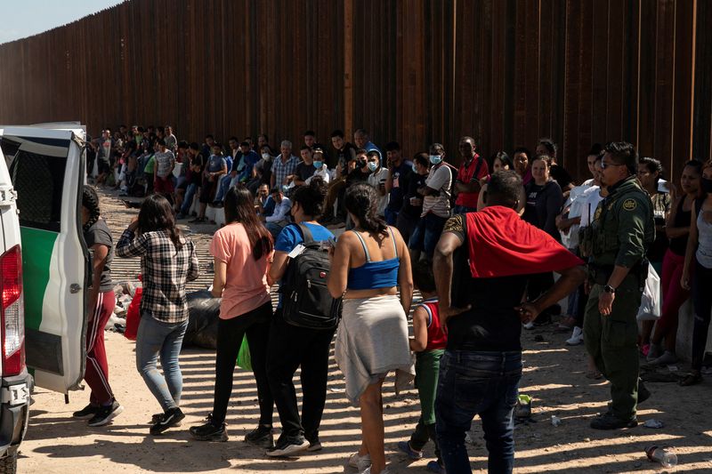 By raft and on foot, migrants cross Rio Grande from Mexico to Texas