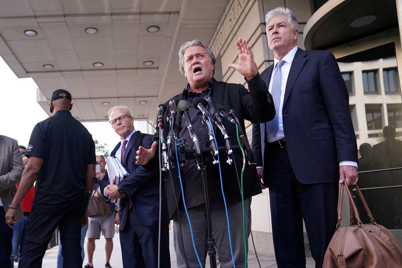 © Reuters. Former Trump White House chief strategist Steve Bannon speaks to members of the press, next to lawyers Matthew Evan Corcoran and David Schoen, as he departs from the second day of the trial of the contempt of Congress charges stemming from his refusal to cooperate with the U.S. House Select Committee investigating the Jan. 6, 2021, attack on the Capitol, at U.S. District Court in Washington, U.S., July 19, 2022. REUTERS/Sarah Silbiger