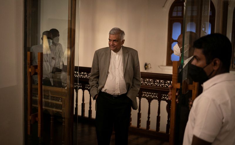 &copy; Reuters. Sri Lanka's Prime Minister Ranil Wickremesinghe arrives for an interview with Reuters at his office in Colombo, Sri Lanka, May 24, 2022. REUTERS/Adnan Abidi/Files