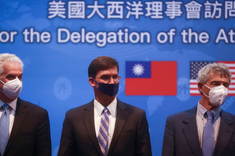 &copy; Reuters. FILE PHOTO: Former U.S. Defense Secretary Mark Esper takes a group photo during a press conference in Taipei, Taiwan, July 19, 2022. REUTERS/Ann Wang