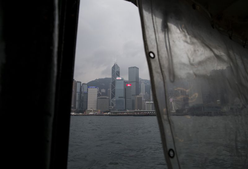 &copy; Reuters. FILE PHOTO: A general view of the Central Business District, including the Bank of China Tower (center L) and China Construction Bank (CCB) Tower are seen from a Star Ferry in Hong Kong's Victoria Harbour December 26,2014. REUTERS/Tyrone Siu 