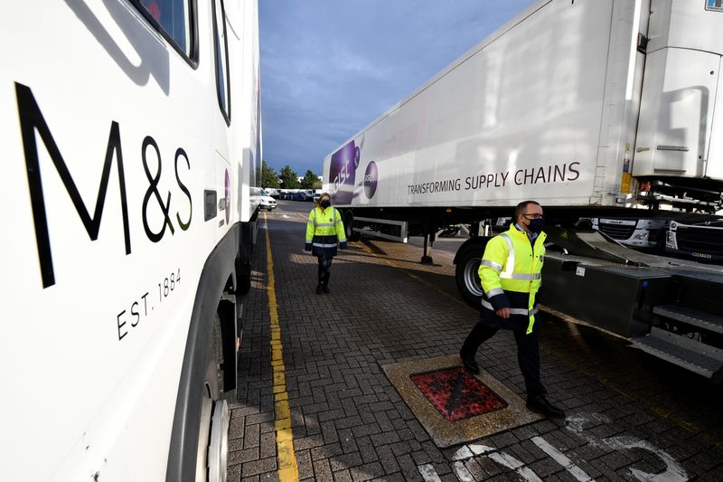 &copy; Reuters. FILE PHOTO: Staff observe COVID-19 Protocols at Gist logistics depot, as British retailer Marks and Spencer rolls out its Vangarde food supply chain programme, aimed to cut down on waste, in Thatcham near Reading, Britain October 9, 2020. REUTERS/Beresfor