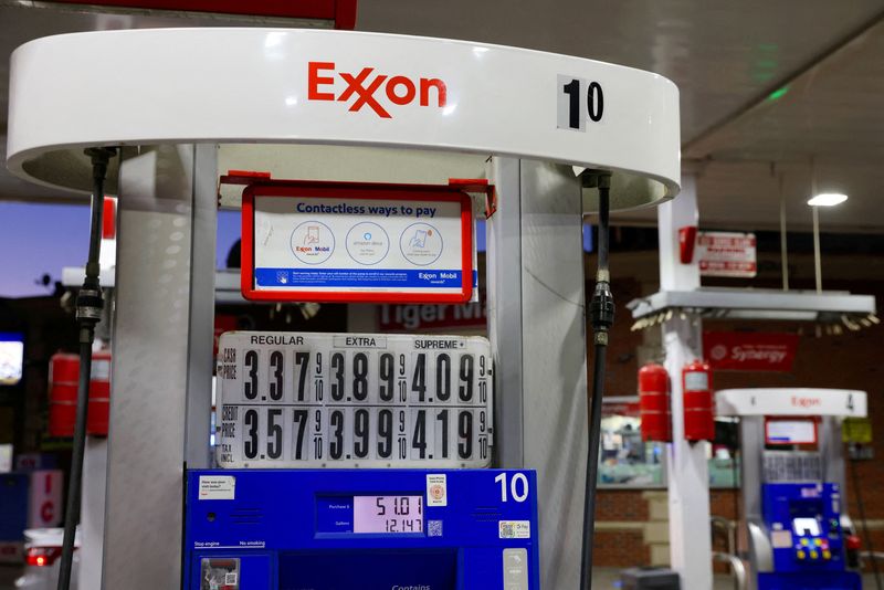 &copy; Reuters. FILE PHOTO: Signage is seen on a gasoline pump at an Exxon gas station in Brooklyn, New York City, U.S., November 23, 2021. REUTERS/Andrew Kelly/