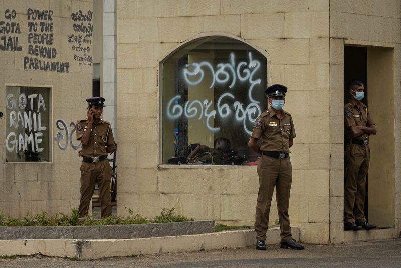 Sri Lankan security troops raid protest camp, 50 injured