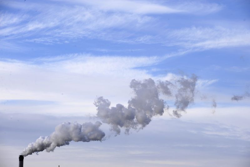 &copy; Reuters. FILE PHOTO: A chimney is seen at an industrial site on Teesside, northern England February 8,2009. REUTERS/Nigel Roddis(BRITAIN)