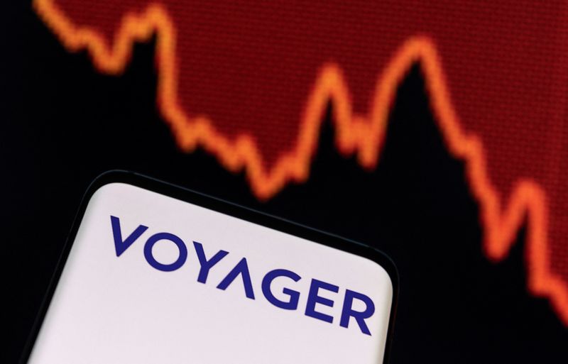&copy; Reuters. Voyager Digital logo and decreasing stock graph are seen in this illustration taken, July 7, 2022. REUTERS/Dado Ruvic/Illustrations