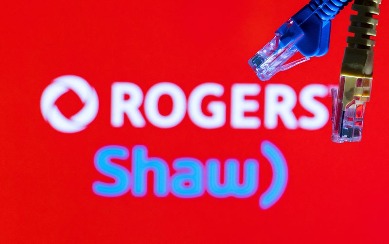 &copy; Reuters. FILE PHOTO: Ethernet cables are seen in front of Rogers and Shaw Communications logos in this illustration taken, July 8, 2022. REUTERS/Dado Ruvic/Illustrations/File Photo