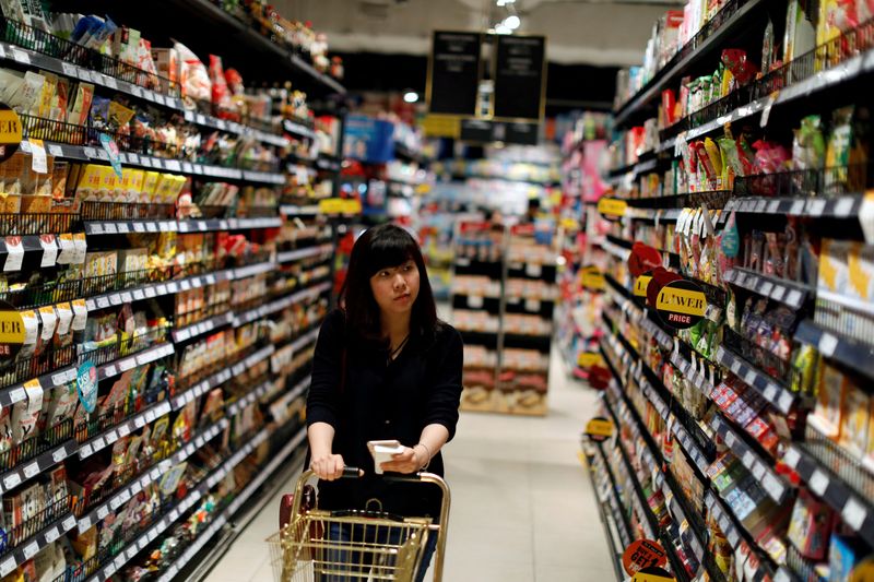 &copy; Reuters. FILE PHOTO: A customer is seen inside the Gourmet Market supermarket in Bangkok, Thailand May 20, 2017. Picture taken May 20, 2017. REUTERS/Jorge Silva/File Photo