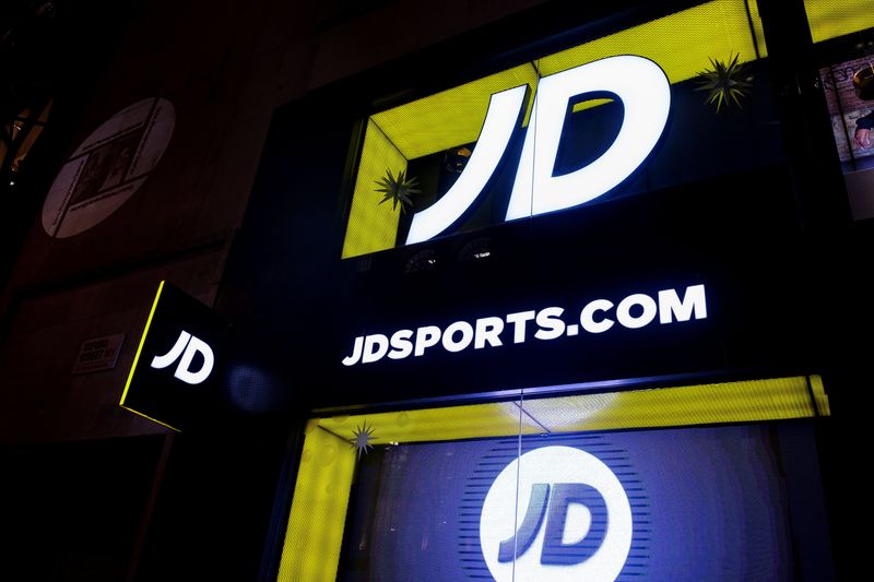 &copy; Reuters. FILE PHOTO: JD Sports logo is seen on the exterior of a store in London, Britain, November 17, 2021. Picture taken November 17, 2021. REUTERS/May James
