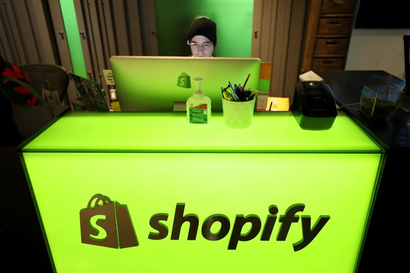 &copy; Reuters. FILE PHOTO: An employee works at Shopify's headquarters in Ottawa, Ontario, Canada, October 22, 2018. REUTERS/Chris Wattie/File Photo  