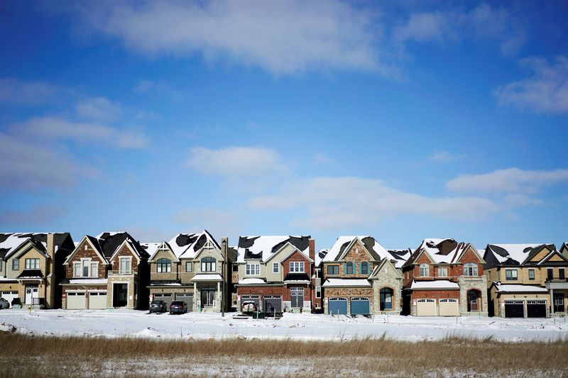 &copy; Reuters. FILE PHOTO: A row of houses stand in a newly built subdivision in East Gwillimbury, Ontario, Canada, January 30, 2018. Picture taken January 30, 2018.    REUTERS/Mark Blinch/File Photo