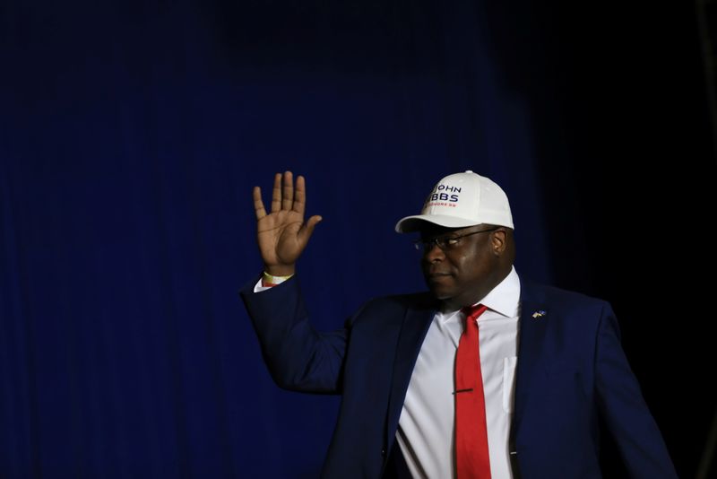 © Reuters. FILE PHOTO: Candidate for Michigan's 3rd Congressional district John Gibbs waves to the crowd as he comes on stage during a rally held by former U.S. President Donald Trump in Washington Township, Michigan, U.S. April 2, 2022. REUTERS/Emily Elconin