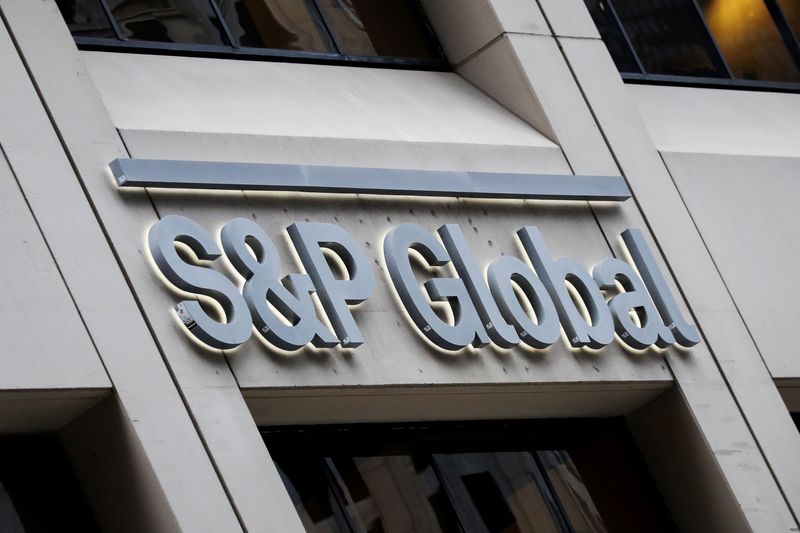 &copy; Reuters. FILE PHOTO: The S&P Global logo is displayed on its offices in the financial district in New York City, U.S., December 13, 2018. REUTERS/Brendan McDermid