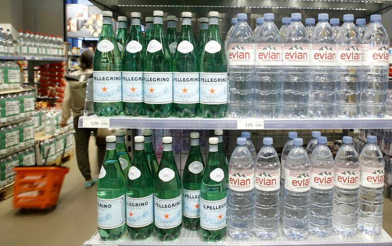 &copy; Reuters. FILE PHOTO: Bottles of San Pellegrino and Evian mineral water are displayed at a supermarket of Swiss retail group Migros in Zurich, Switzerland June 24, 2020. REUTERS/Arnd Wiegmann/File Photo