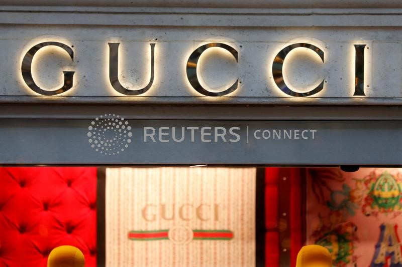 © Reuters. FILE PHOTO: A Gucci sign is seen outside a shop in Paris, France, December 18, 2017. REUTERS/Charles Platiau/File Photo