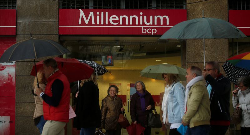 &copy; Reuters. FILE PHOTO: People walk near a branch of Millennium BCP Bank in downtown Lisbon, Portugal, May 11, 2016.  REUTERS/Rafael Marchante