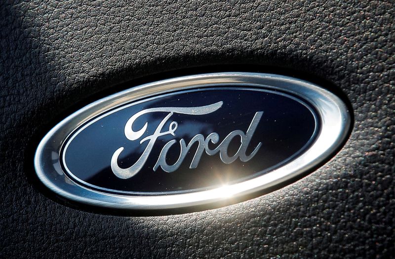 &copy; Reuters. FILE PHOTO: The Ford name plate is seen on the interior of the Ford F-150 Lightning pickup truck during a press event in New York City, U.S., May 26, 2021.  REUTERS/Brendan McDermid