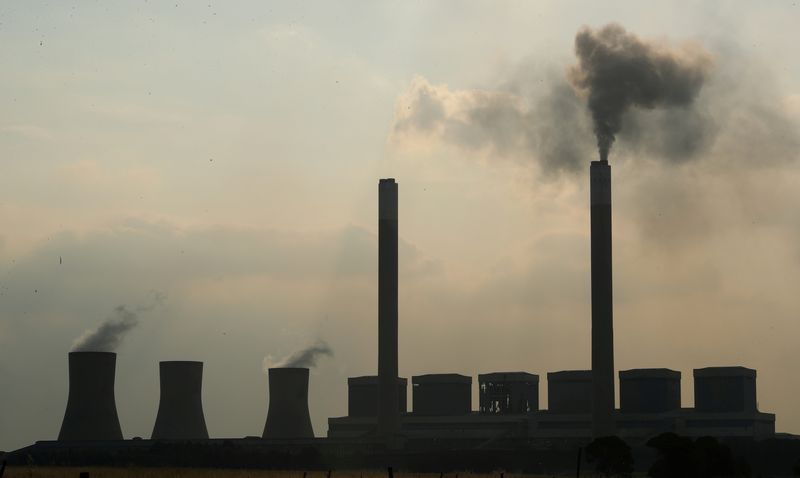 &copy; Reuters. FILE PHOTO: Smoke rises from the Duvha coal-based power station owned by state power utility Eskom, in Mpumalanga province, South Africa, 18 February, 2020. REUTERS/Mike Hutchings/