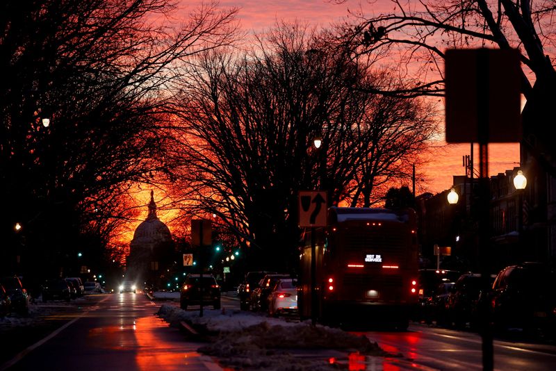 &copy; Reuters. FILE PHOTO: The sunset lights up the sky behind the U.S. Capitol dome on the eve of the first anniversary of the January 6th attack on the Capitol, in Washington, U.S. January 5, 2022.  REUTERS/Jonathan Ernst/File Photo