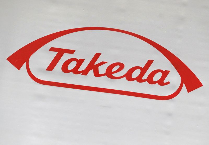 © Reuters. FILE PHOTO: The logo of Takeda Pharmaceutical Co. is displayed at the company's news conference venue in Tokyo, Japan May 9, 2018.  REUTERS/Kim Kyung-Hoon