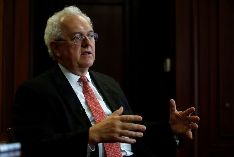 &copy; Reuters. FILE PHOTO: Jose Antonio Ocampo, member of the board of the central bank of Colombia, speaks during an interview with Reuters in Bogota, Colombia August 10, 2017. REUTERS/Jaime Saldarriaga