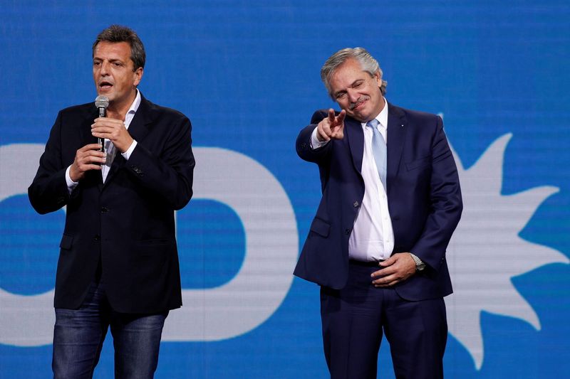 &copy; Reuters. FILE PHOTO: Sergio Massa, President of the Chamber of Deputies, addresses the audience as Argentina's President Alberto Fernandez gestures during an event after midterm elections in Buenos Aires, Argentina, November 14, 2021. REUTERS/Agustin Marcarian/Fil