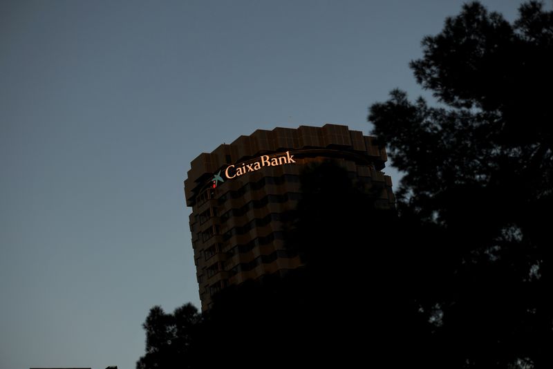 &copy; Reuters. CaixaBank's logo is seen on top of the company's headquarters in Barcelona, Spain January 29, 2022. REUTERS/Nacho Doce