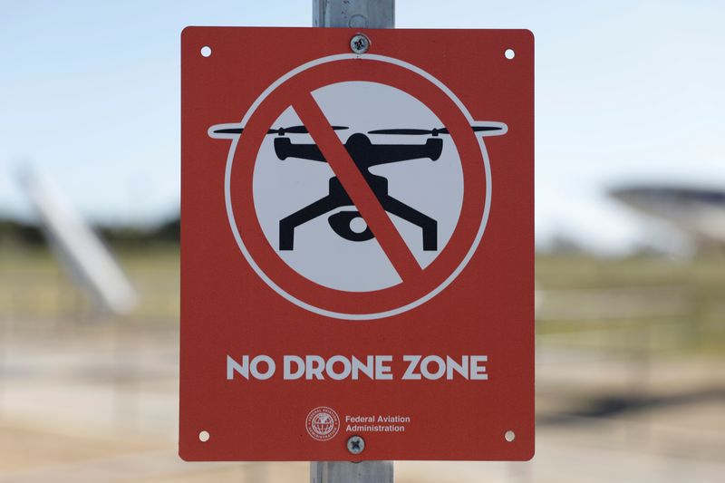 &copy; Reuters. FILE PHOTO: A Federal Aviation Administration (FAA) sign warns against the use of civilian drones outside Point Mugu Naval Air Station (NAS) near Oxnard, California, U.S., March 29, 2022. Picture taken March 29, 2022.  REUTERS/Chris Helgren