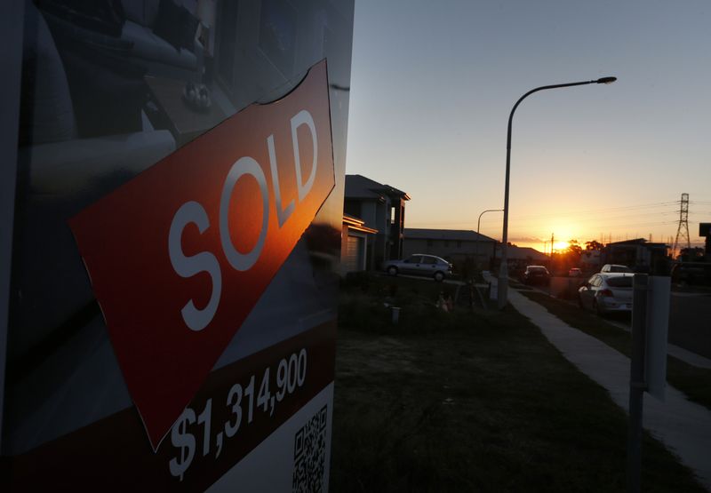 &copy; Reuters. FILE PHOTO: New homes and land for sale are pictured in southern Sydney August 14, 2014. More wealthy Chinese are moving their money out of China to invest in Australia's property market as the corruption crackdown in Asia's biggest economy gathers moment