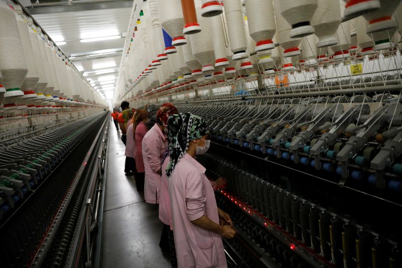 &copy; Reuters. Workers are seen in front of a product line in a textile factory in Diyarbakir March 21, 2017. Picture taken March 21, 2017. REUTERS/Umit Bektas