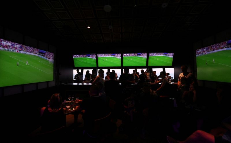 &copy; Reuters. Soccer Football - Fans watch England v Germany in the Women's Euro 2022 final on a Royal Caribbean boat on the Mediterranean Sea, July 31, 2022  REUTERS/Carl Recine