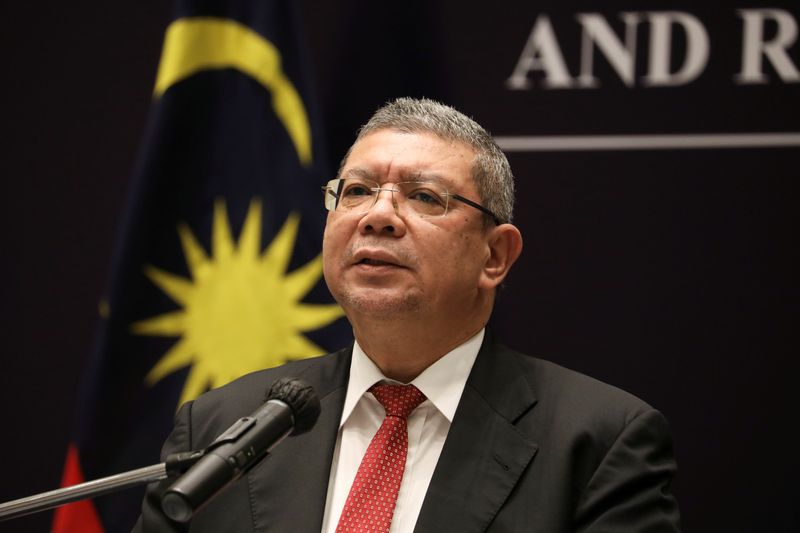 &copy; Reuters. FILE PHOTO: Malaysia's Foreign Minister Saifuddin Abdullah speaks during a news conference after ASEAN Summit in Kuala Lumpur, Malaysia, October 28, 2021. REUTERS/Lim Huey Teng