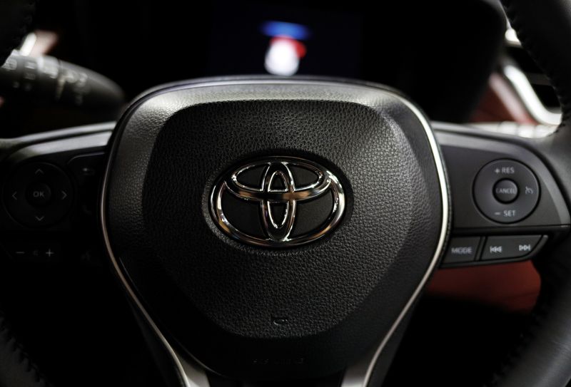 Hit by rising costs and supply snarls, Toyota profit tumbles 42%