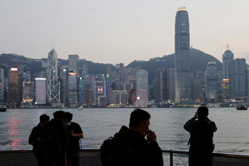 &copy; Reuters. FILE PHOTO: A general view of the Central financial district during sunset, in Hong Kong, China March 11, 2021. REUTERS/Tyrone Siu