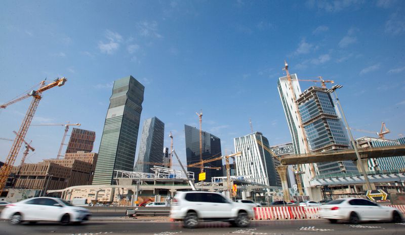 &copy; Reuters. FILE PHOTO: Cars drive past the King Abdullah Financial District in Riyadh, Saudi Arabia, November 12, 2017. REUTERS/Faisal Al Nasser/File Photo