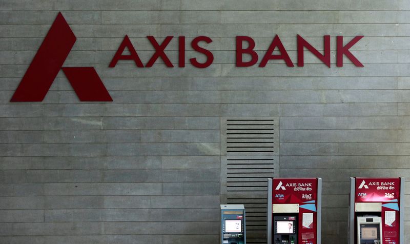 &copy; Reuters. FILE PHOTO: Axis Bank's logo is seen next to ATM machines at its corporate headquarters in Mumbai, India July 25, 2017. REUTERS/Danish Siddiqui