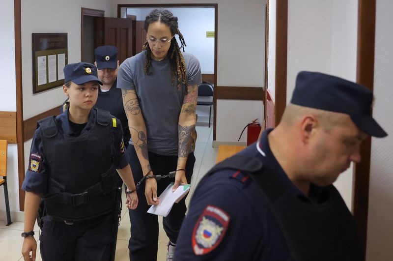 In handcuffs and led away, Griner says: 'I love my family'