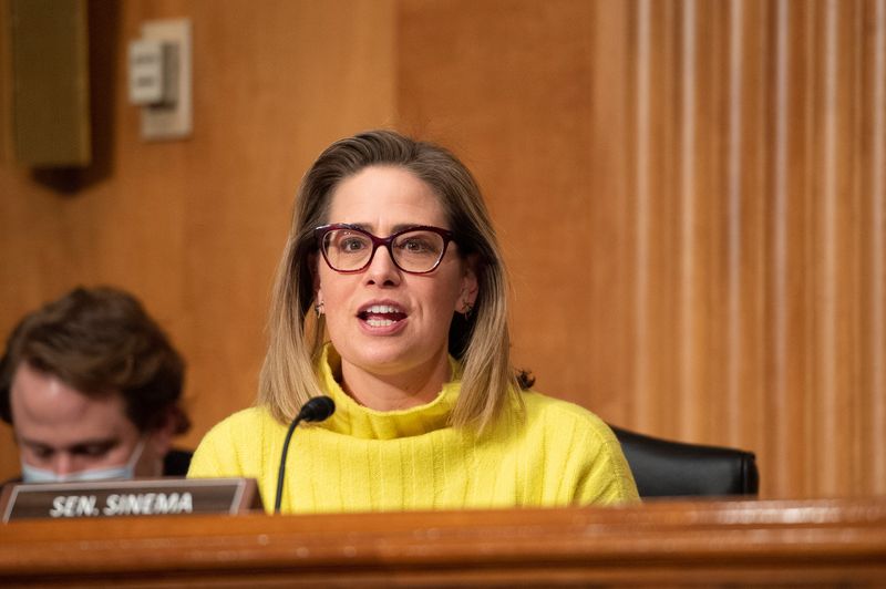 © Reuters. FILE PHOTO: Senator Kyrsten Sinema, a Democrat from Arizona, speaks during a Senate Homeland Security and Governmental Affairs Committee confirmation hearing for Shalanda Young, director of the Office of Management and Budget (OMB) nominee for U.S. President Joe Biden, in Washington, D.C., U.S., February 1, 2022. Bonnie Cash/Pool via REUTERS