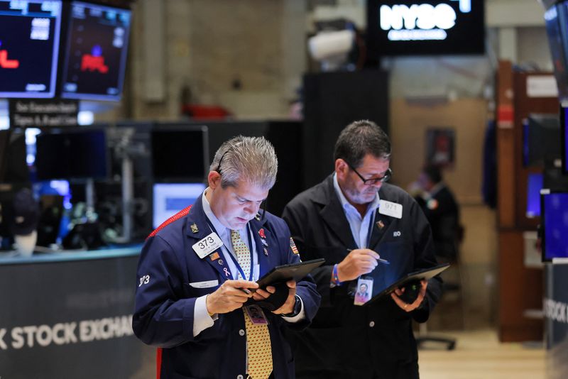 &copy; Reuters. Traders work on the trading floor at the New York Stock Exchange (NYSE) in Manhattan, New York City, U.S., August 3, 2022. REUTERS/Andrew Kelly