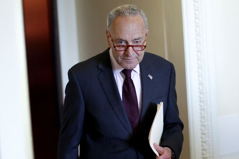 © Reuters. U.S. Senate Majority Leader Chuck Schumer (D-NY) departs after a news conference to tout the $430 billion drug pricing, energy and tax bill championed by Democrats at the U.S. Capitol in Washington, U.S. August 5, 2022.  REUTERS/Jonathan Ernst